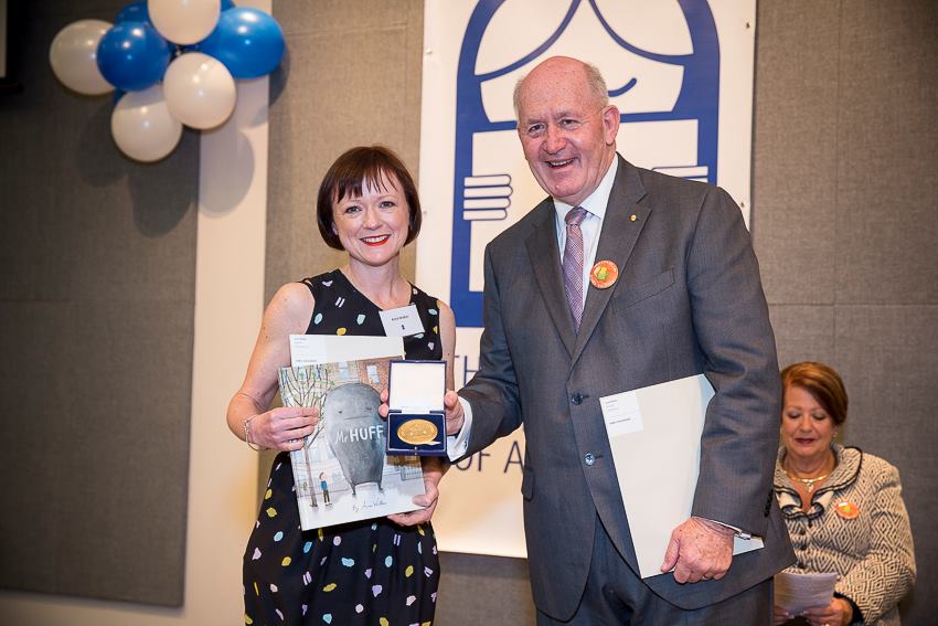 Anna Walker accepts her Award form the Governor-General Sir Peter Cosgrove